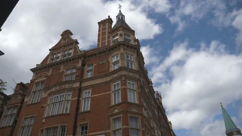 Time lapse. Clouds moving over a classic European building. Stock Footage 136764218