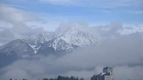 Time lapse clouds moving over small town Kranj in Slovenia Stock Footage 141714786