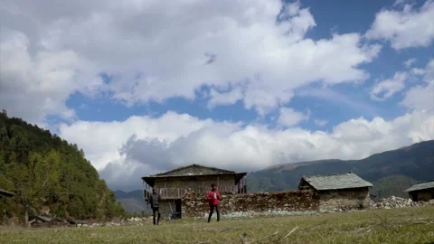 Time lapse clouds moving over Traditional house, Dhorpatan Nepal Stock Footage 155909597