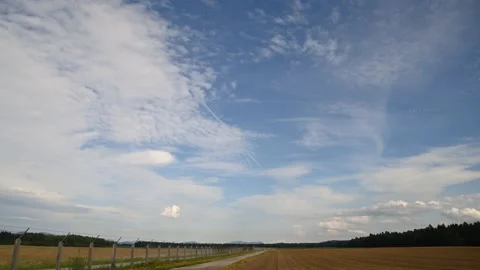 Time lapse of clouds moving over Ljubljana Airport, Slovenia Stock Footage 164296530