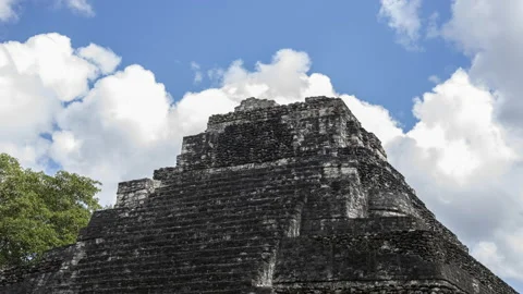 Time lapse of clouds moving over Mayan Pyramid Stock Footage 232708567