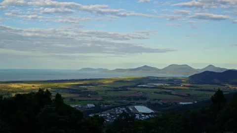 Time Lapse of Clouds Moving Over Farmland near Cairns, Australia. Stock Footage 246804877