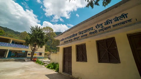 Time-Lapse of Clouds Moving Over Rautu ki Beli School in the Morning,Uttarakhand Stock Footage 263349319