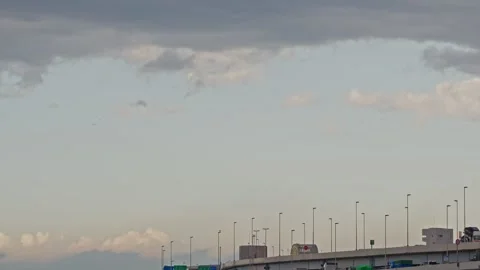 Time-lapse of Clouds Moving Over Multi-Level Urban Highway in Japan Stock Footage 333416512