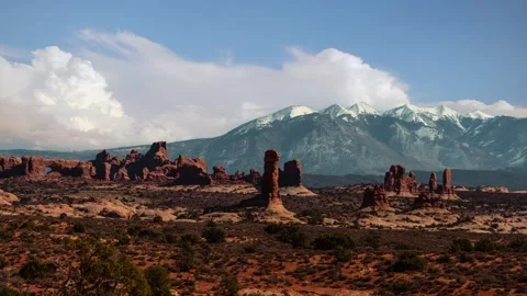 Time lapse of clouds moving over Delicate Arch in Arches National Park, Utah Stock Footage 344451320