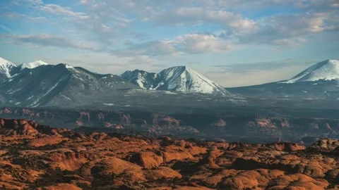 Time lapse of clouds moving over Delicate Arch in Arches National Park, Utah Stock Footage 344451368