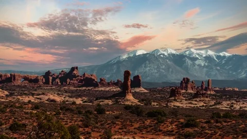 Time lapse of clouds moving over Delicate Arch in Arches National Park, Utah Stock Footage 344451566