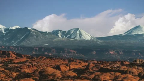 Time lapse of clouds moving over Delicate Arch in Arches National Park, Utah Stock Footage 345177538