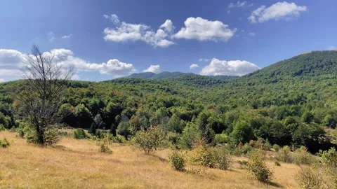 Time-Lapse Of Clouds Moving Over Mountain Stock Footage 345440918