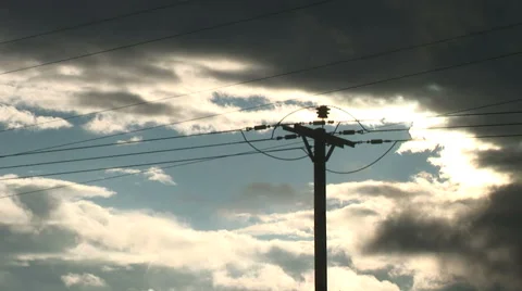 Time lapse of clouds moving past electricity post and wires 스톡 동영상 40159053