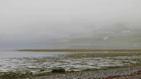 Time Lapse Clouds moving on the Scottish coast Ullapool Stock Footage 94793481