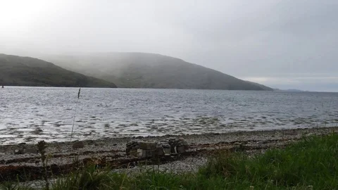 Time Lapse Clouds moving on the Scottish coast Ullapool 2 Stock Footage 94793558
