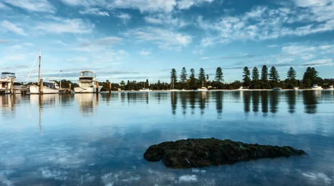 Time Lapse - Clouds moving at the shore of Swan Lake, Fremantle, Australia. Stock Footage 67873020