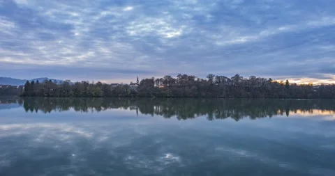 Time lapse of clouds moving in the sky with reflection on the water Stock Footage 225252822