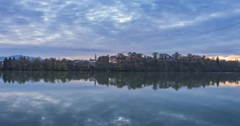 Time lapse of clouds moving in the sky with reflection on the water Stock Footage 225252965