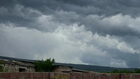 Time lapse of clouds moving on a stormy day Stock Footage 97119856