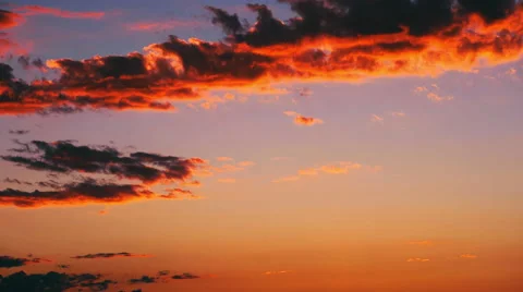 Time Lapse of Clouds moving at Sunset. 動画素材 65436322