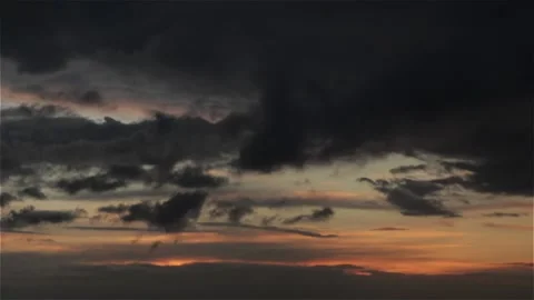 Time-lapse of clouds moving in sunset Stock Footage 139060352