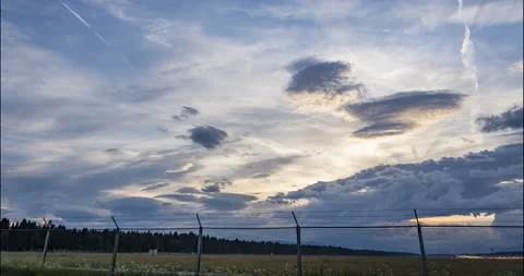Time lapse of clouds moving at sunset Stock Footage 158202592