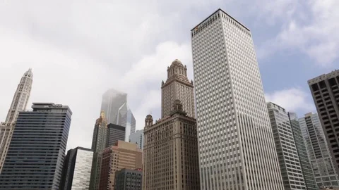 Time lapse of clouds moving through skyscrapers in the city. Chicago, Illinois Stock Footage 79697273