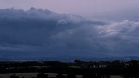 Time lapse of clouds moving through the valley Stock Footage 116682252
