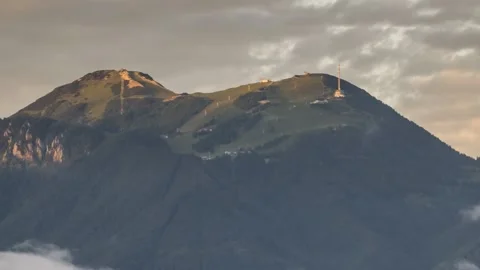 Time lapse of clouds moving under the mountain in the valley Stock Footage 133900166