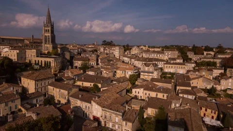 Time-lapse of clouds moving village at dusk Stock Footage 83864099