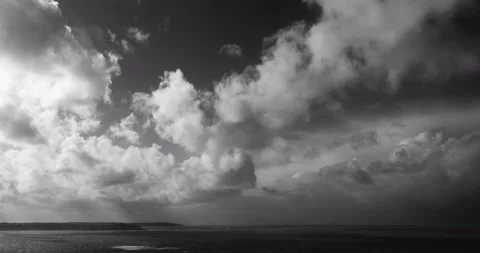 Time Lapse - Clouds obscuring sky and shadowing the sea at the evening. Stock Footage 150590330