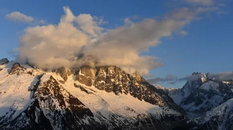 Time lapse with clouds over the Aiguille Verte / The Alps Stock Footage 61819595