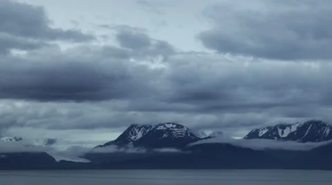 Time lapse: Clouds over Alaskan mountain glacier Stock Footage 39816779