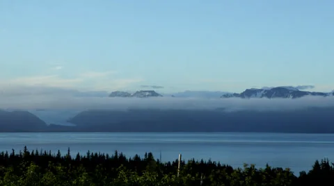 Time lapse: Clouds over Alaskan mountain glacier Stock Footage 39816818