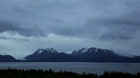 Time lapse: Clouds over Alaskan mountain glacier Stock Footage 39817152