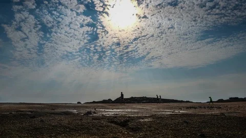 Time Lapse of clouds over beach in Bretagne/Brittany, France Stock Footage 88386995
