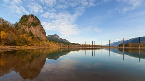 Time Lapse of Clouds Over Beacon Rock along Columbia River Gorge one Fall Day 4k Stock Footage 56749783