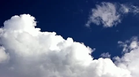 Time lapse clouds over blue sky Stock Footage 11418374