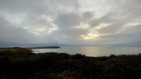 Time lapse of clouds over Carnivan bay Stock Footage 144782896