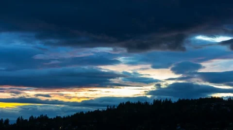 Time lapse of clouds over city of Happy Valley OR from sunset into blue hour 4k Stock Footage 68410568