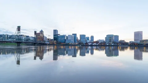 Time lapse of clouds over city skyline of Portland Or with water reflection 4k Stock Footage 73671963