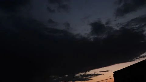Time lapse of clouds over the city Stock Footage 193104849