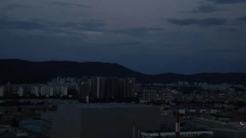 Time lapse clouds over the city at night 스톡 동영상 303550960