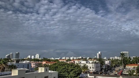 Time lapse of clouds over cityscape Stock Footage 125395337