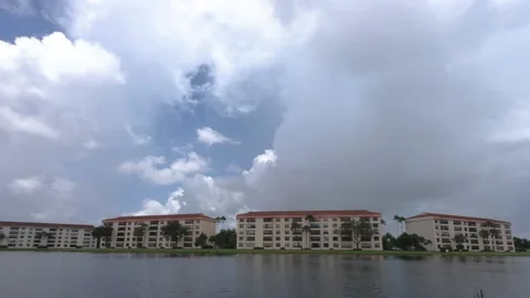 Time-Lapse Clouds Over Condos Stock Footage 200893478