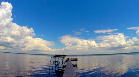 Time Lapse of clouds over a dock on a Lake No.2 Video stock 45417329