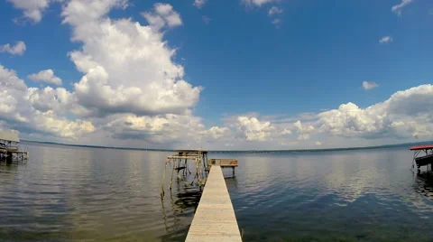 Time Lapse of clouds over a dock on a Lake No.1 Stock Footage 45417352