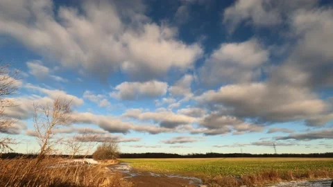 Time lapse of clouds over empty fields. Stock Footage 153064800