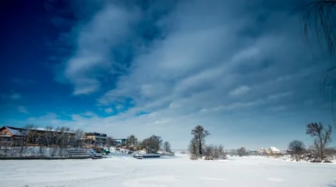 Time lapse with clouds over a frozen lake Stock Footage 45986828
