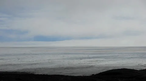 Time-lapse of clouds over a glacier / ice sheet in Iceland Stock Footage 30312113