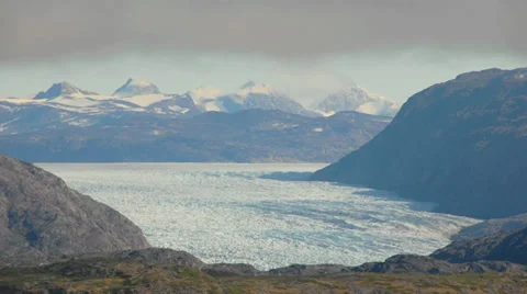 Time-lapse of clouds over a glacier in Greenland Vídeo Stock 30312194