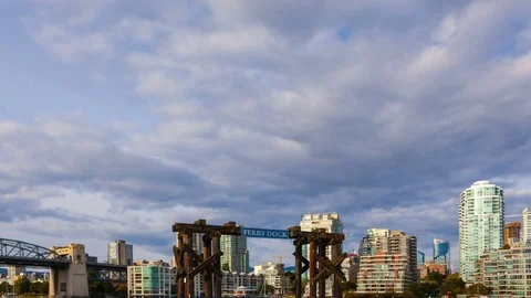 Time lapse of clouds over Granville Island ferry dock in Vancouver BC Canada 4k Stock Footage 80389164