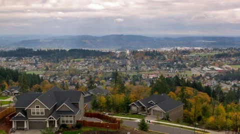 Time Lapse of clouds over Happy Valley Oregon residential suburbs homes in fall 스톡 동영상 56750701